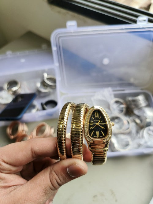 BVLGAR I SERPENTI SNAKE WATCH HALF DIAMOND XoticCollection