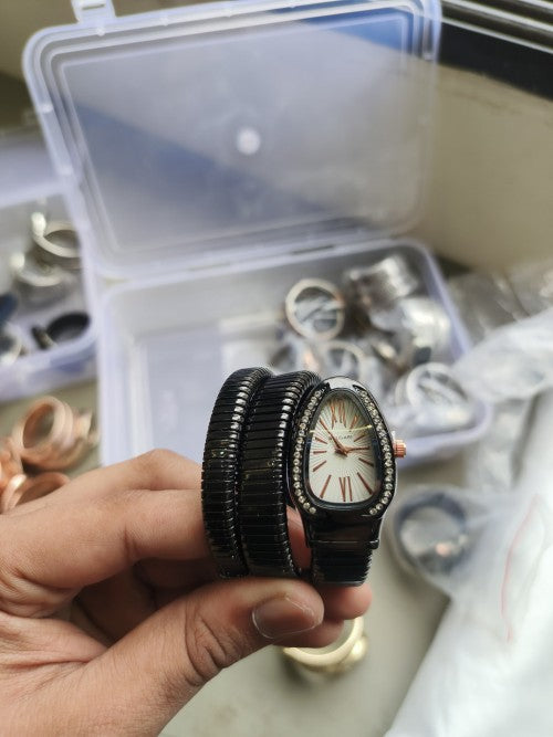 BVLGAR I SERPENTI SNAKE WATCH HALF DIAMOND XoticCollection