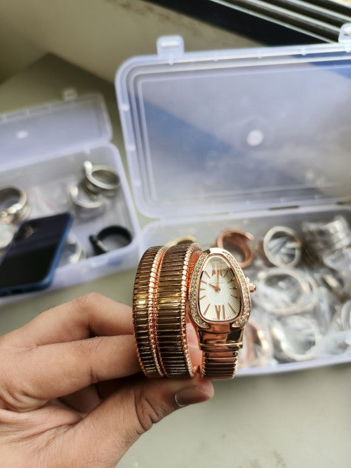 BVLGAR I SERPENTI SNAKE WATCH HALF DIAMOND XoticCollection