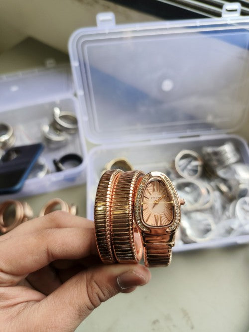 BVLGAR I SERPENTI SNAKE WATCH HALF DIAMOND XoticCollection