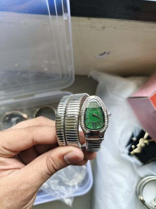 BVLGAR I SERPENTI SNAKE WATCH HALF DIAMOND XoticCollection