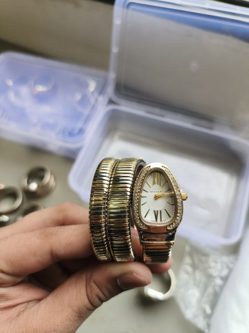 BVLGAR I SERPENTI SNAKE WATCH HALF DIAMOND XoticCollection