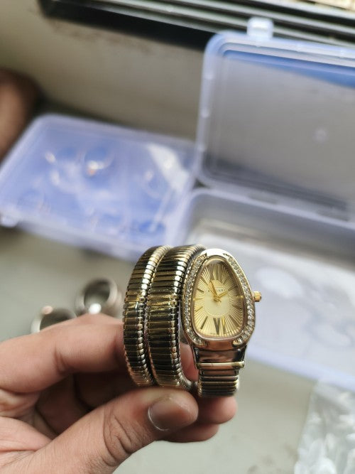 BVLGAR I SERPENTI SNAKE WATCH HALF DIAMOND XoticCollection